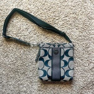 Black and gray Coach crossbody
